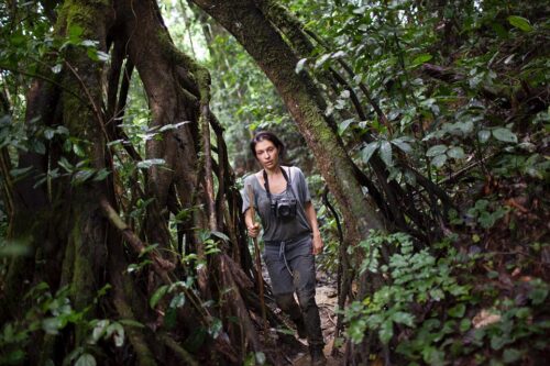 Diana Zeynab Alhindawi, a 37 year old Brooklyn based photographer of Romanian Iraqi heritage at work in the African Jungle