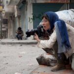 The Italian photojournalist Andreja Restek, founder and director of the APR news website at work in Aleppo, Syria